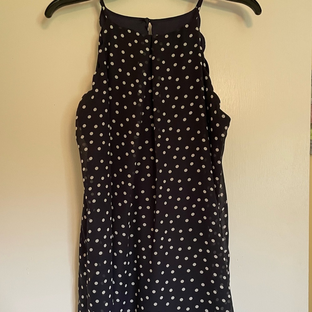 Sleeveless navy blue polka dot dress